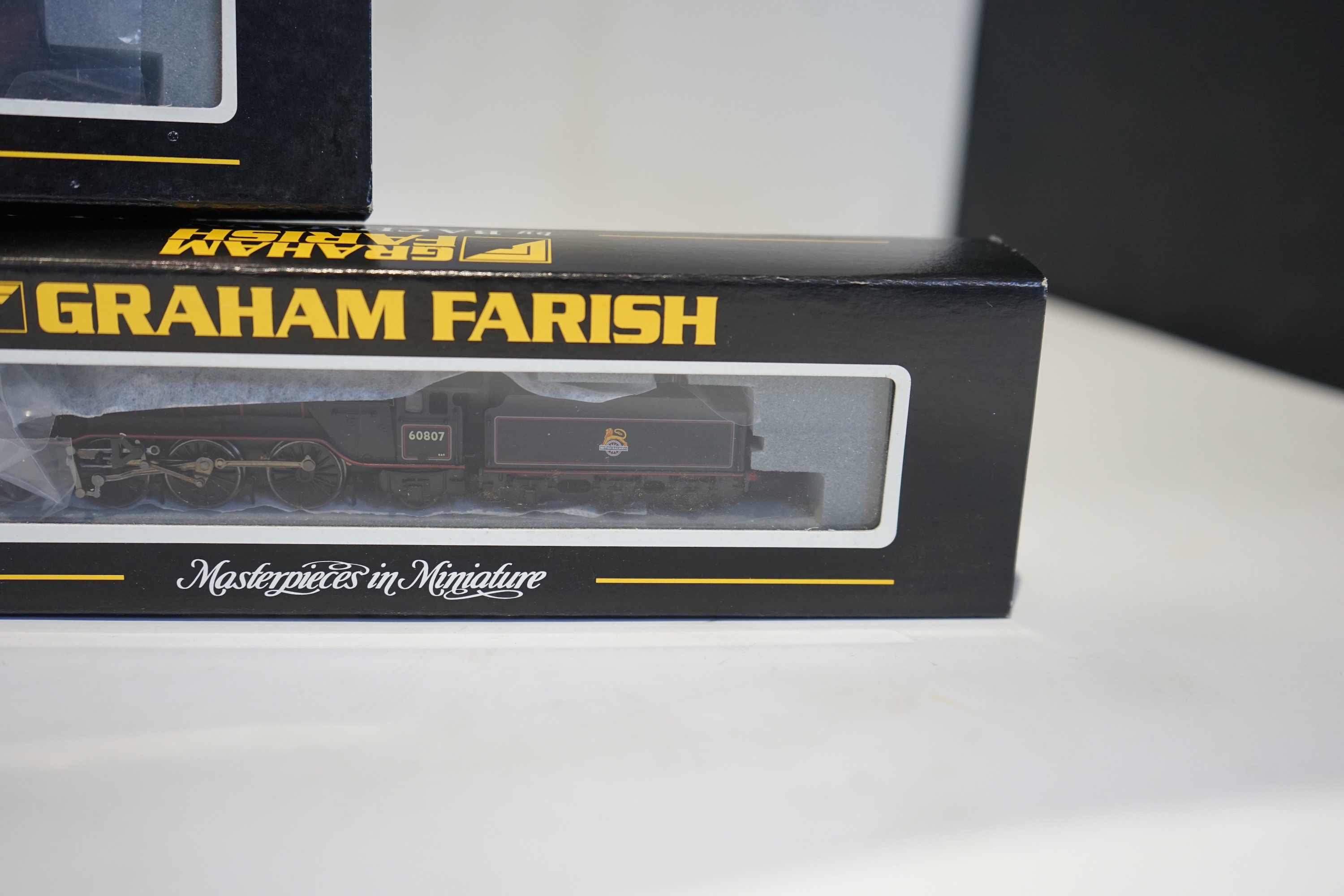 Three boxed Graham Farish N gauge railway BR tender locomotives; a Class 8F, 48045 (372-151), a Class V2, 60807 (372-601), and a Class V2, 60800 (372-600). Condition - good.